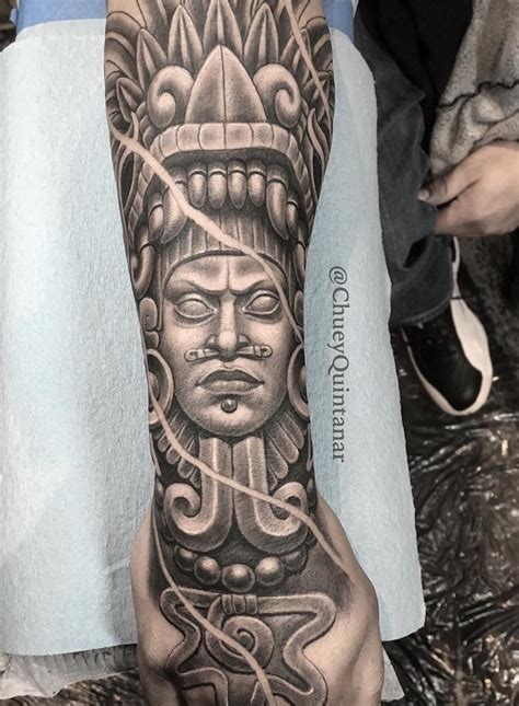 Aztec tattoos on arm - An Aztec armband tattoo further complements the Aztec shoulder tattoo, encircling the upper arm with intricate Aztec-inspired patterns, thus creating a striking and cohesive look that showcases the …